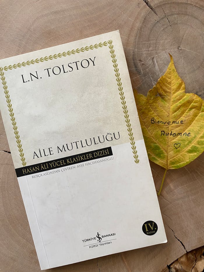 Still Life with a White Book and Yellow Leaf on a Stump